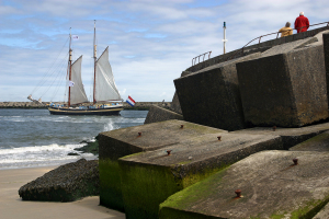 sailing boat leaving the harbour of Scheveningen