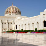 Muscat – Exterior view of the Sultan Qaboos Grand Mosque on a sunny day, Wilayat Bawshar, Muscat Oman